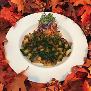 Butternut and YellowSquash, Carrots, Onions, RedPotato and #Hydroponic Kale sautéed and served with house Rice and a grilled Green Onion Tamari Vinaigrette #MeatlessMonday at Cafe Evergreen in Nokomis