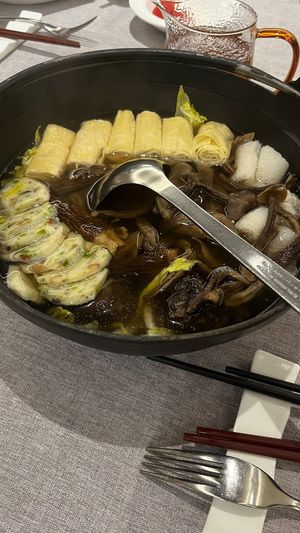The mushroom soup with tofu skins and cabbage; delicious with a deep mushroom flavour; not spicy whatsoever  at Soodle - 蔬稻·素菜 in Guangzhou