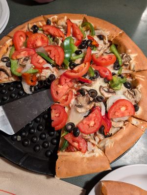Grateful Veg pizza with vegan cheese at Woodstock's Pizza in San Luis Obispo