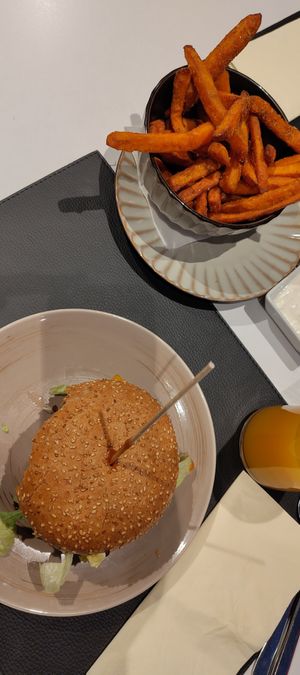 Burger and Sweet Potato Fries at Burger Lounge in Himmelreich