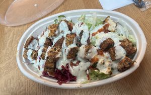 Tofu kotti rice bowl with vegan white sauce, all included toppings but omit feta  at Kotti Berliner Doner Kebab in New York City
