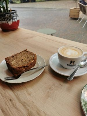 Banana cake (delicious and a huge slice) and oat cappuccino at KLUTS in Utrecht