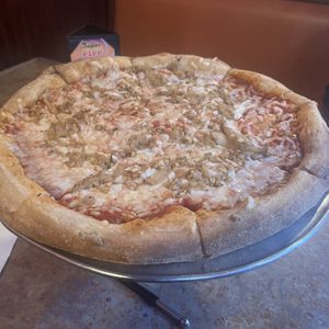 Large pizza with dairy free cheese, tempeh, and caramelized onions    at Mellow Mushroom in Denton