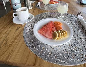 Fruits. Juice. Coffee with almond milk 🥛   at Hotel Miconia Restaurant in San Cristobal