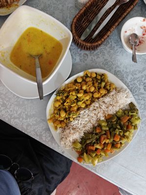 Semolina soup (starter) and main that was mix of chickpea stew, rice and "scrambled" vegetables. at Veggie House in Puno