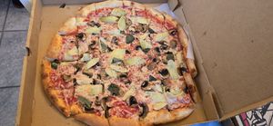 Vegan artichoke and mushroom pizza with Vegan cheese at L'Osteria Mondello in Cheyenne