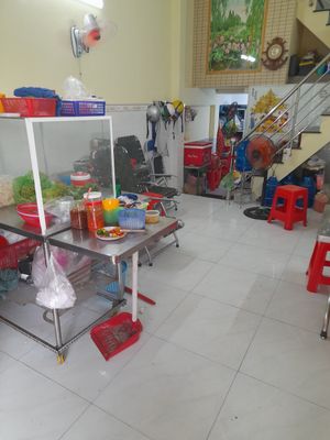 Seating inside the family house at Thiện Phước in Ho Chi Minh City
