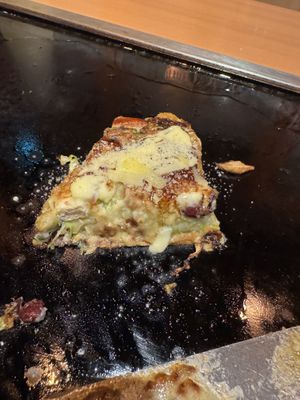 Vegetarian Okonomiyaki (the vegan option with added cheese)   at Kaisen Monjya Ebizo in Osaka