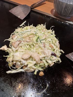 Vegan Okonomiyaki (still cooking)  at Kaisen Monjya Ebizo in Osaka