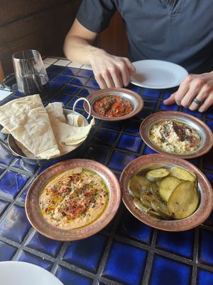 Hummus/dips and spicy pickles   at Clay & Fire in Kansas City