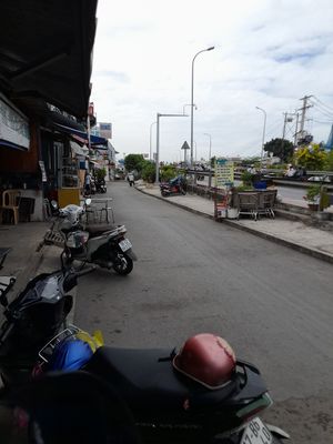Looking out to the busy road bridge at Hủ Tiếu Chay Âu Lạc Q7 in Ho Chi Minh City