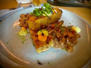 Polenta with mushrooms and vegan mayonnaise, delicious  at Hotel & Restaurant Fines in Santa Magdalena