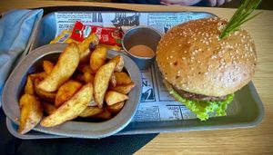 Vegan burger with french fries  at Hotel & Restaurant Fines in Santa Magdalena