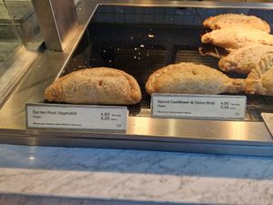 Garden root vegetable pasty and spiced cauliflower and onion bhaji pasty at The Cornish Bakery   in Plymouth