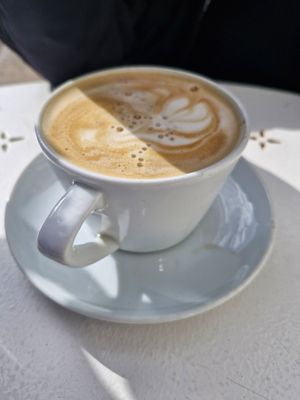 Oat milk latte at The Orangery Garden Cafe in Torpoint