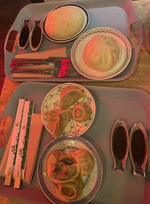 Mixed dumplings and bao buns to share at Pink Moon  in Brighton