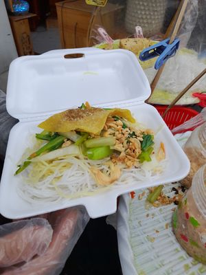 Preparing my take away vegan food at Bun Xao Chay Ngon  in Ho Chi Minh City