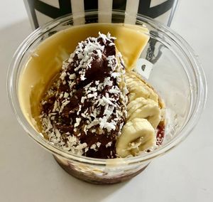 Coconut, pecan and banana with peanut butter and agave at Drizz Soft Serve Açai in Dubai