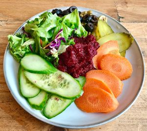 Beetroot hummus with salad  at Baker's Kitchen Destination Restaurant in Dubai