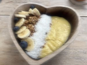 Bliss the Tropics bowl with mango, pineapple, papaya, passionfruit, banana, turmeric and coconut milk  at Bliss the Berry in Willemstad