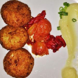 Artichoke cakes with root vegetable purée  at Nanuchka in Tel Aviv