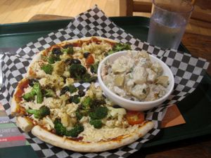 Vegan pizza with Daiya and marinated veggies. Excellent, but maybe too much cheese. at Resto Vego in Montreal