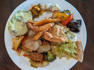 another of my plates, mostly hot dishes (including leek quiche), and an avocado half in citrus dressing with capers at Resto Vego in Montreal