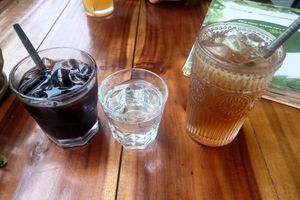 Coffee, kombucha and complementary water at The Veg Restaurant - Nha hang Chay in Hanoi