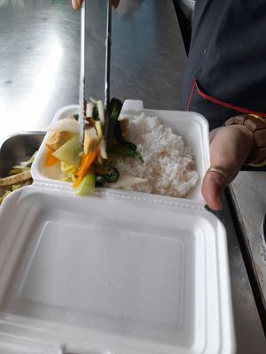 Preparing my take away vegan food at Cơm chay Từ Tam in Ho Chi Minh City