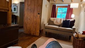 Lounge with 2 settees, log burner and smart tv at Gorllan in Eglwyswrw