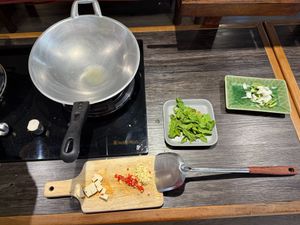 prepping stir fry at Thai Akha Kitchen Cooking School in Chiang Mai