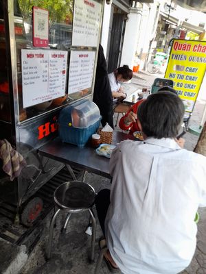 Outside dining area. On the pavement outside the house/ restaurant at Quán chay Thiện Quang in Ho Chi Minh City