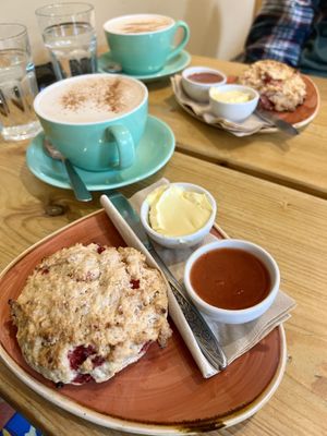 Strawberry and lemon scone with strawberry, peach and orange jam & matcha lattes   at Roots Cafe Inv in Inverness