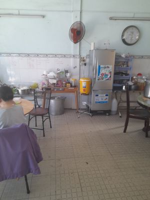Dining area outside the family home. In a big yard at Hủ Tiếu Chay in Ho Chi Minh City