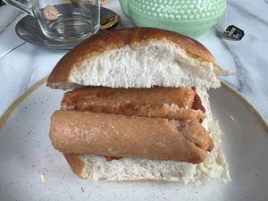 Vegan sausage with tomato chutney roll   at Hillhead Café in Inverness