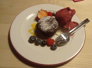 "Schokoladen-Küchlein mit flüßigem Salzkaramellkern
& Kokossorbet" at Alpenrose Bayrischzell in Bayrischzell