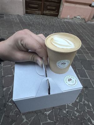 Oat milk latte, and vegan cream puffs  at Cukráreň Bez Cukru in Kosice