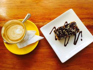 salted caramel slice and soy latte  at Bliss Organic Garden Cafe in Adelaide