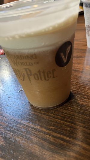 Frozen butter beer with non-dairy topping   at Three Broomsticks  in Universal City