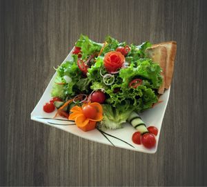 Seasonal Veggies Salad with French Dressing at Samlee's Garden in Pakxe