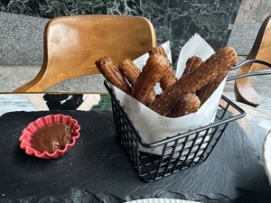 Vegan churros and chocolate sauce   at Hause Rooftop Senopati in Jakarta