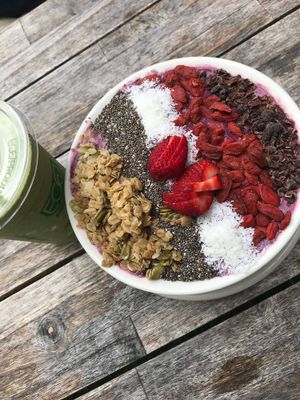 Mint chip smoothie and a berry smoothie bowl. at Healthy Being Juicery in Jackson