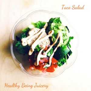 Fan fav Taco Salad! Walnut crumble, spicy cashew cheese, pico de gallo, guacamole. lime, mixed greens. Nutritious and delicious! at Healthy Being Juicery in Jackson