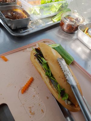 Preparing my vegan banh mi at HỒNG ÂN in Ho Chi Minh City