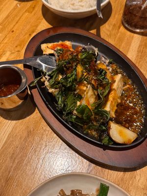 Maa-Kaeur Tod Rad Prik (unique hot plate crispy eggplant dish) at Khao Tiew in San Francisco