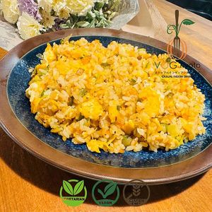 Our flavorful & Customizable Fried Rice is a savory dish packed with vibrant vegetables and cooked to perfection. A delicious and versatile dish at VOG Kyoto! at VOG Kyoto in Kyoto