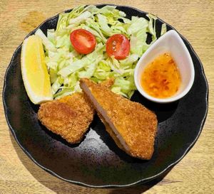 Experience the satisfying crunch of our signature Plant-Based Cutlet. This vegan-friendly "katsu" features a succulent, protein-rich center coated in crisp panko breadcrumbs. at VOG Kyoto in Kyoto