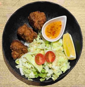 A delicious, cruelty-free take on a Japanese soul food classic. Our plant-based karaage is marinated in a traditional savory, fried to a perfect golden crunch.  at VOG Kyoto in Kyoto