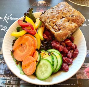 Salad bowl and bread  at Britpop Brunch - Great British Restaurant in Dubai