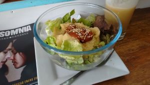 Salad with hummus and dressing at Vitaminica Portena in Valparaiso